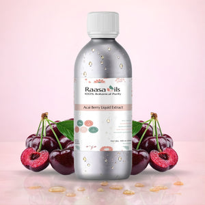 Bottle of Raasa Oils Acai Berry Liquid Extract with a pink background and cherries.