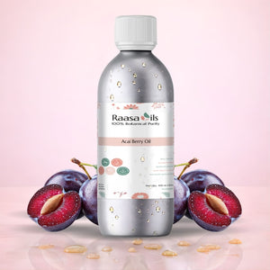 Raasa Oils Acai Berry Oil bottle with acai berries on a pink background