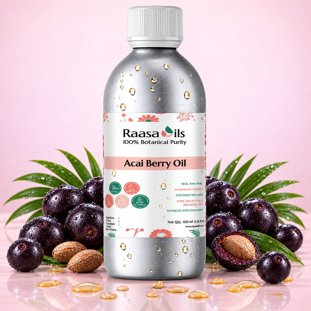 A bottle of Raasa Oils Acai Berry Oil centered on a pink background, surrounded by whole and halved acai berries, green leaves, and scattered golden oil droplets. The bottle is metallic silver with a white cap and a white label featuring the Raasa Oils brand name.
