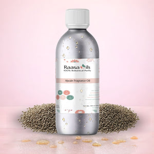 Bottle of Raasa Oils Awain Fragrance Oil with sesame seeds on a pink background