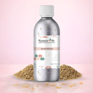 Raasa Oils bottle with a white cap on a pink background