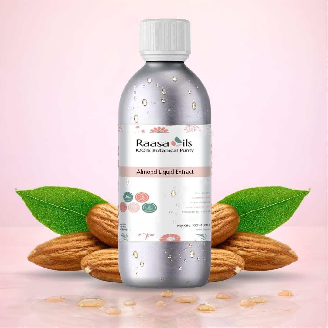 Bottle of Raasa Oils Almond Liquid Extract with almonds and leaves on a pink background