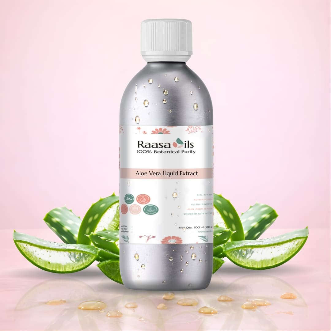 Bottle of Raasa Oils Aloe Vera Liquid Extract with aloe vera leaves on a pink background