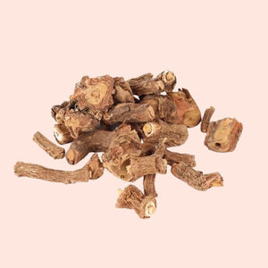 Dried roots on a beige background