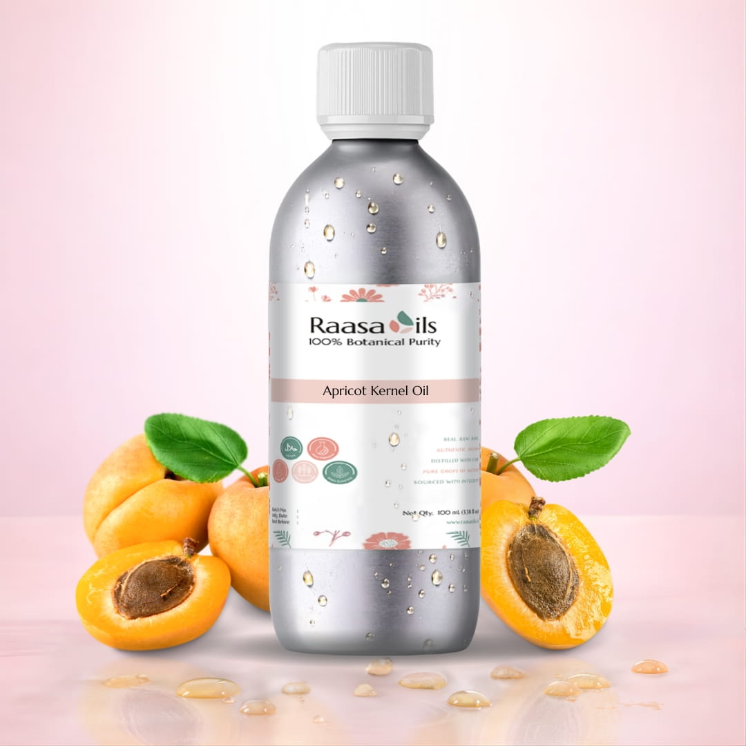 Bottle of Raasa Oils Apricot Kernel Oil with apricots on a pink background