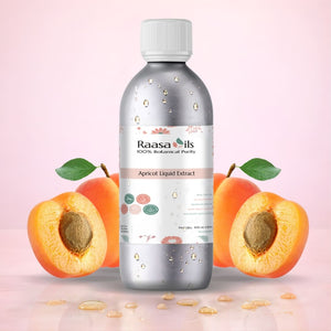Bottle of Raasa Oils Apricot Liquid Extract with apricots on a pink background