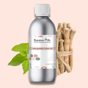 Bottle of Raasa Oils Ashwagandha Carrier Oil with leaves and roots on a pink background