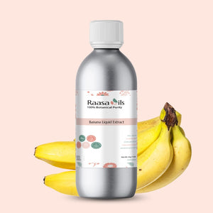 Bottle of Raasa Oils Banana Liquid Extract with bananas on a light pink background