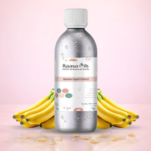 Bottle of Raasa Oils Banana Liquid Extract with bananas on a pink background