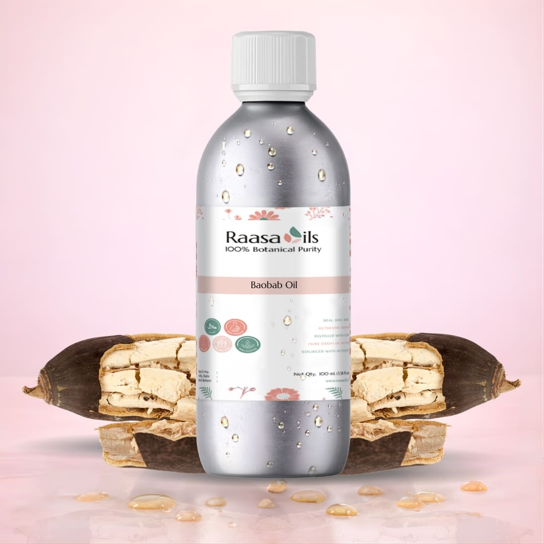 Bottle of Raasa Oils Baobab Oil with baobab fruit on a pink background