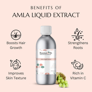 Bottle of Raasa Oils Amla Liquid Extract with benefits listed on a pink background