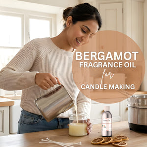Woman pouring liquid into a jar with Bergamot fragrance oil for candle making.