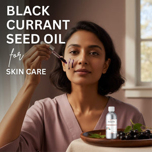 Woman applying black currant seed oil to her skin with a dropper, surrounded by black currants.