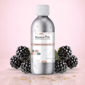 Bottle of Raasa Oils Blackberry Fragrance Oil with blackberries on a pink background