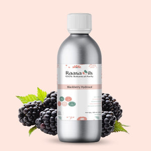 Bottle of Raasa Oils Blackberry Hydrofolol with blackberries and leaves on a light pink background
