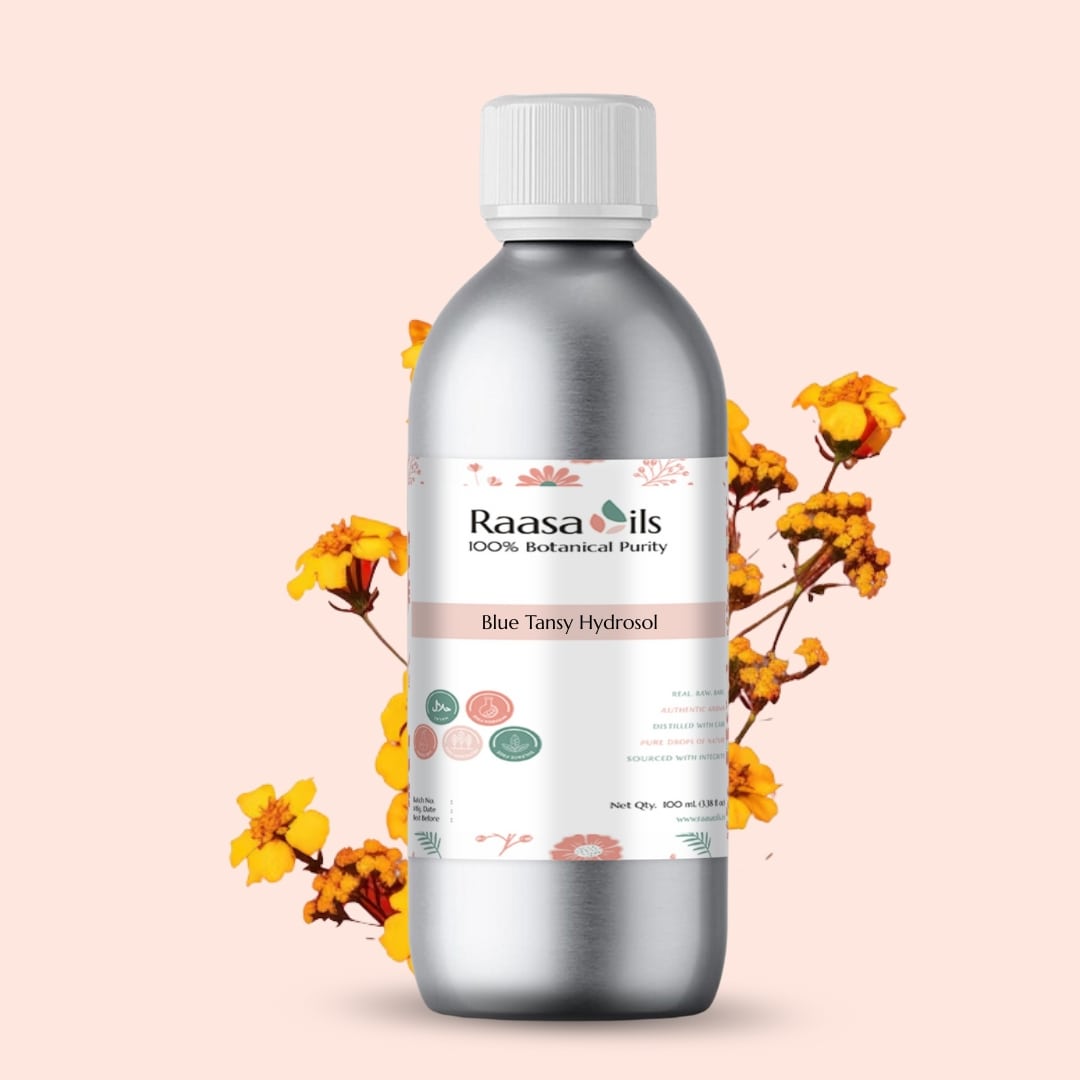 Bottle of Raasa Oils with floral elements on a light pink background