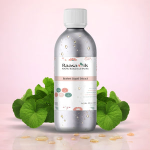 Bottle of Raasa Oils Brahmi Liquid Extract with green leaves on a pink background