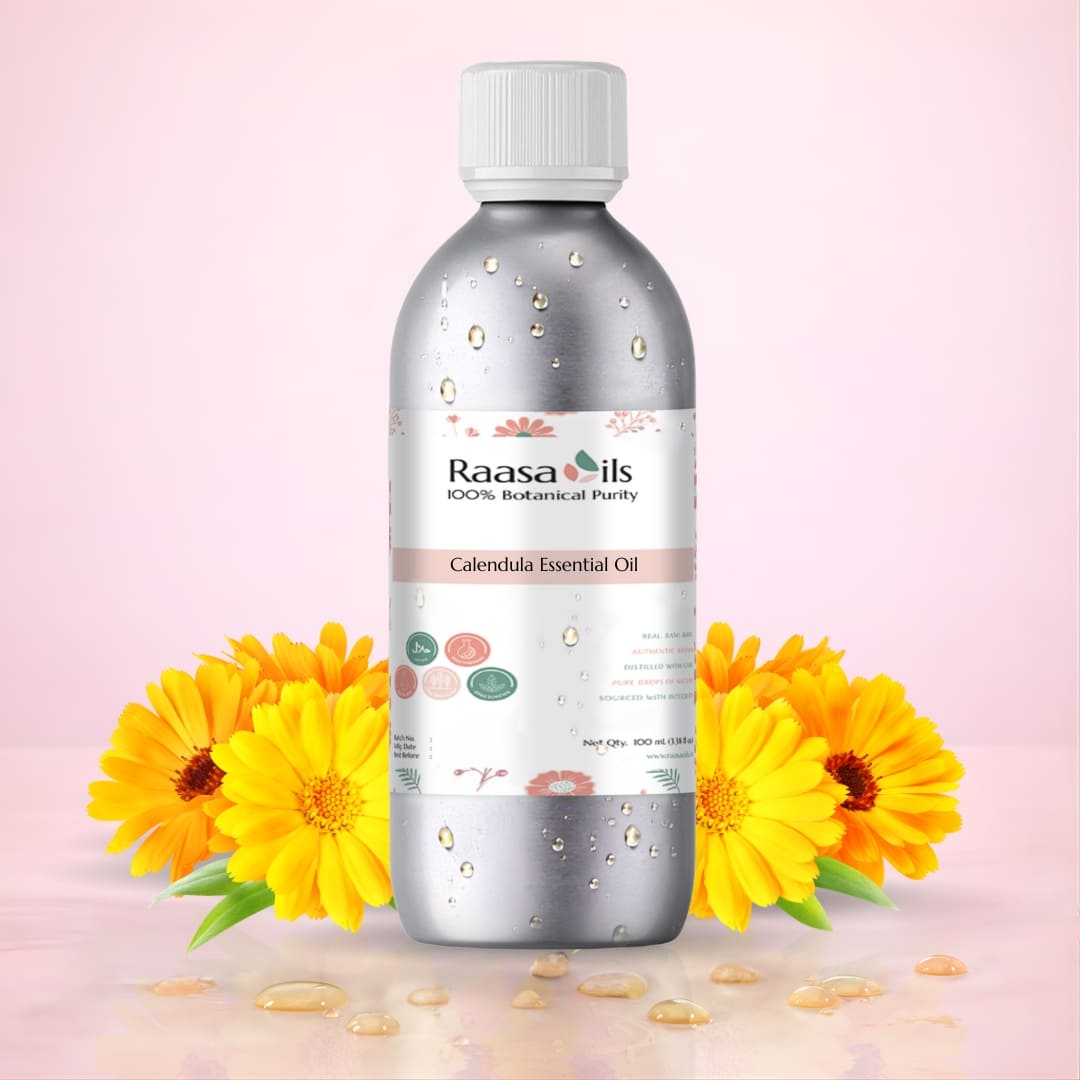 Bottle of Raasa Oils Calendula Essential Oil with calendula flowers on a light pink background