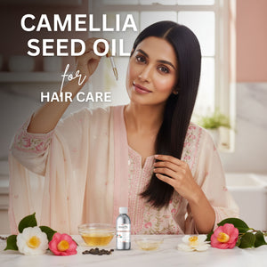Woman with long hair holding a bottle of Camellia Seed Oil for hair care in a kitchen setting.