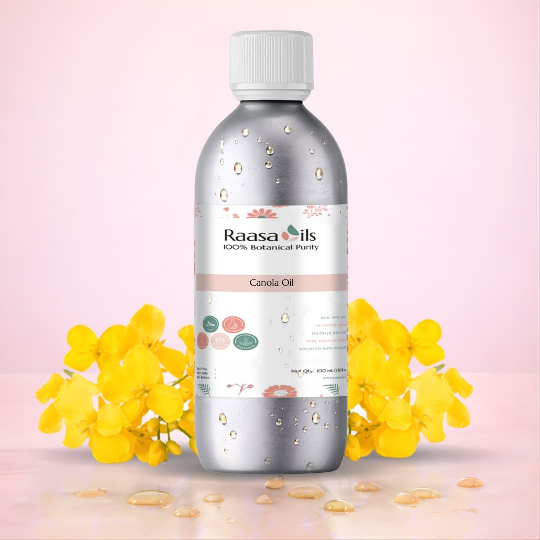 Raasa Oils Canola Oil bottle with yellow flowers on a pink background