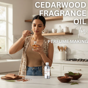 Woman in a kitchen using cedarwood fragrance oil for perfume making