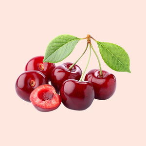 Bunch of cherries with a pink background