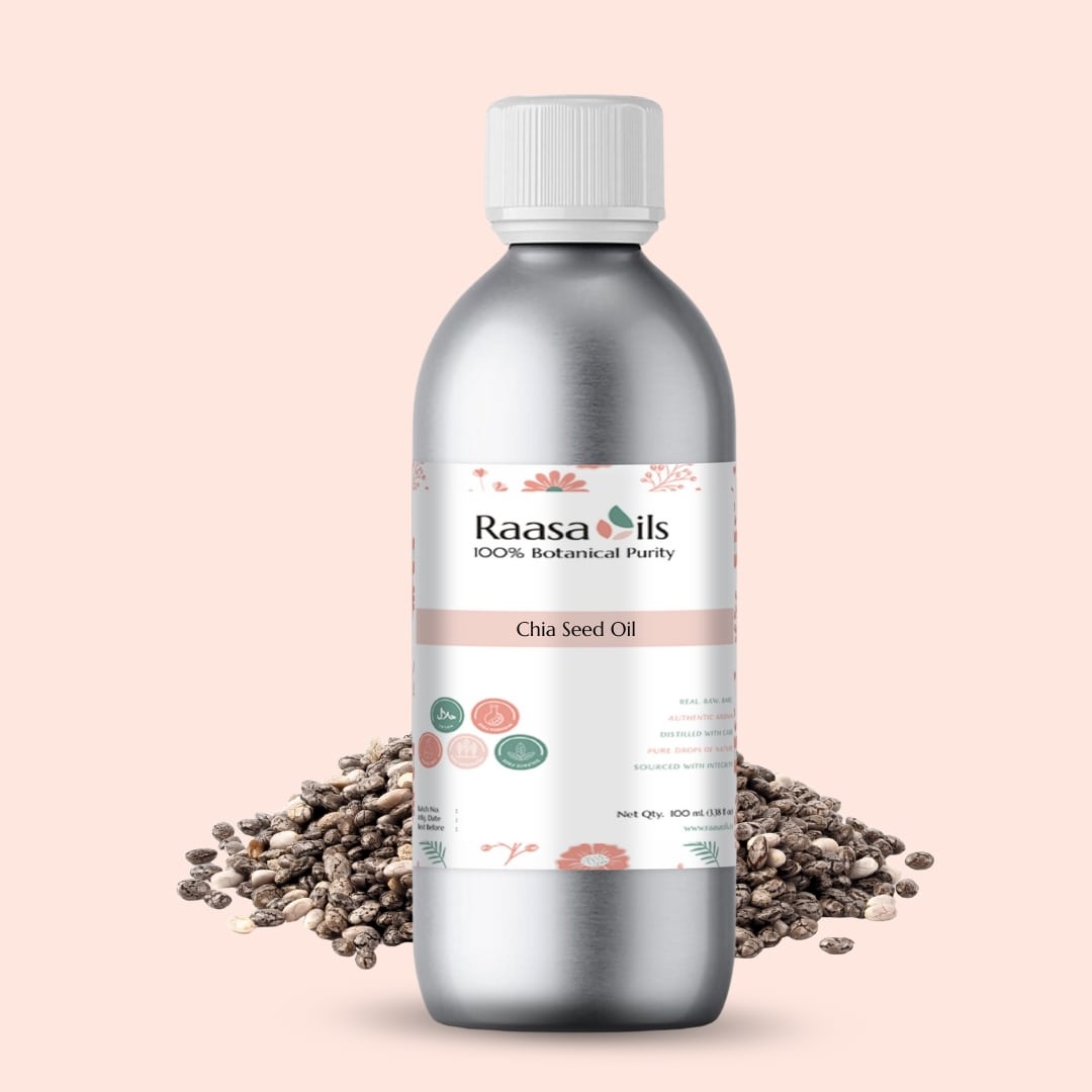 Bottle of Raasa Oils Chia Seed Oil with seeds on a light pink background