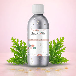 Bottle of Raasa Oils Citronella Liquid Extract with green leaves on a pink background