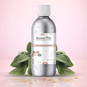 Raasa Oils Clary Sage Essential Oil bottle with green leaves on a pink background