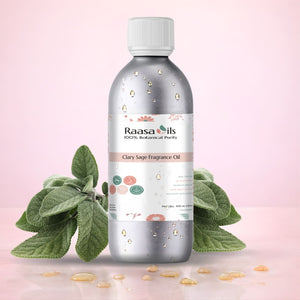 Bottle of Raasa Oils Clary Sage Fragrance Oil with green leaves on a pink background