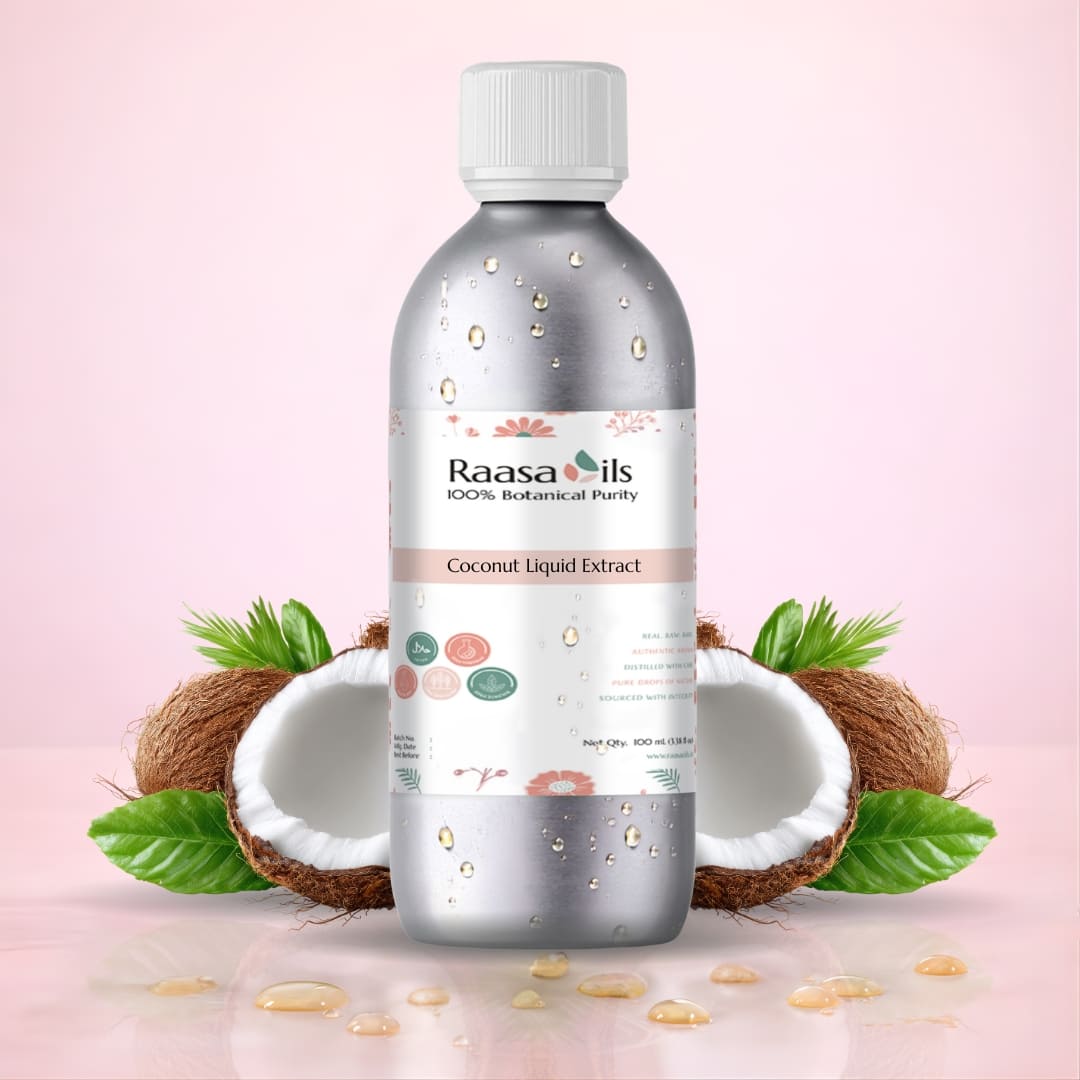 Raasa Oils coconut liquid extract bottle with coconuts and leaves on a pink background