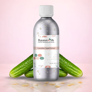 Bottle of Raasa Oils Cucumber Liquid Extract with cucumbers on a pink background
