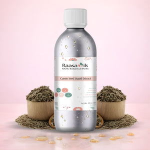 Bottle of Raasa Oils Cumin Seed Liquid Extract with cumin seeds on a pink background