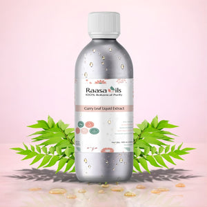 Bottle of Raasa Oils Curry Leaf Liquid Extract with curry leaves on a pink background