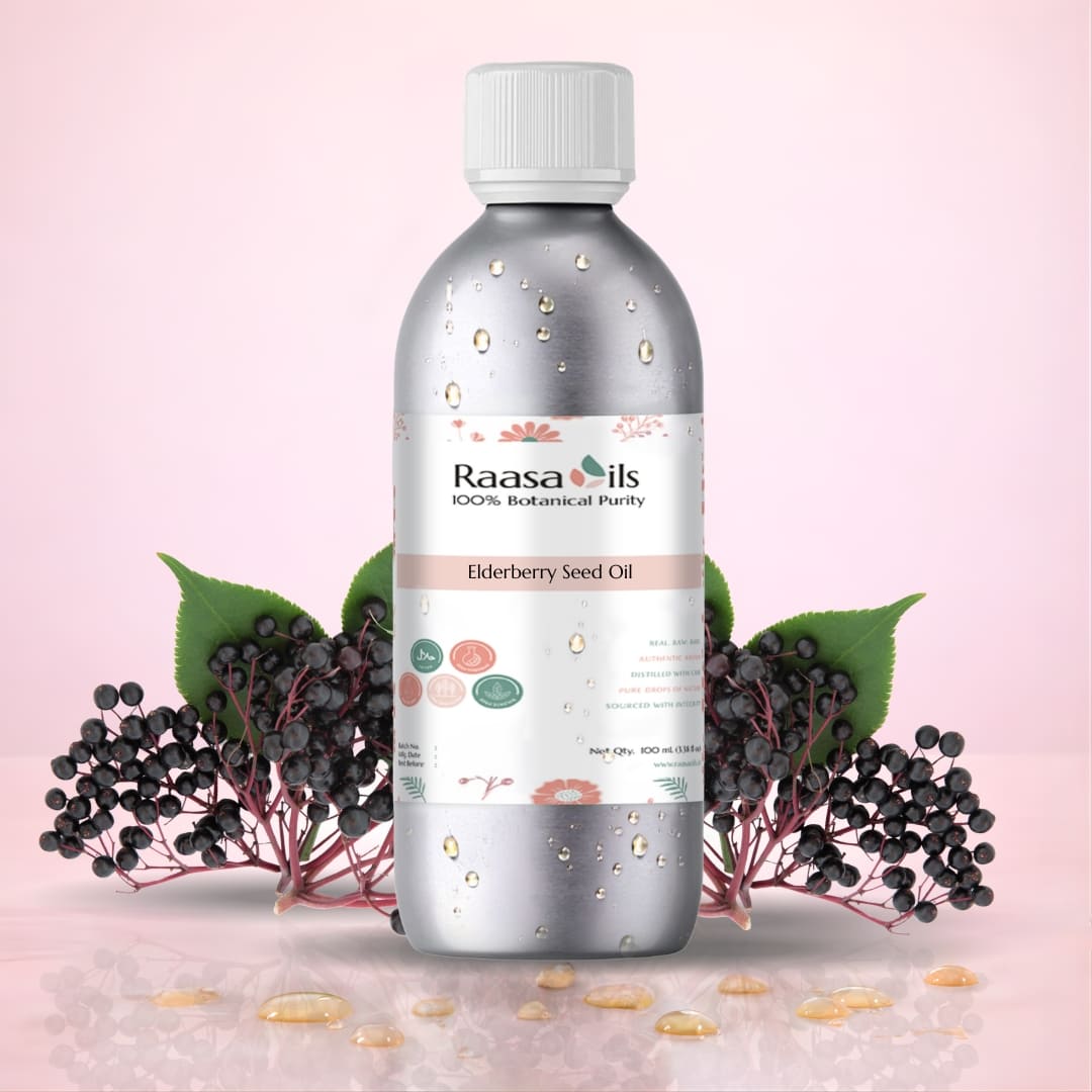 Raasa Oils elderberry seed oil bottle with leaves on a pink background