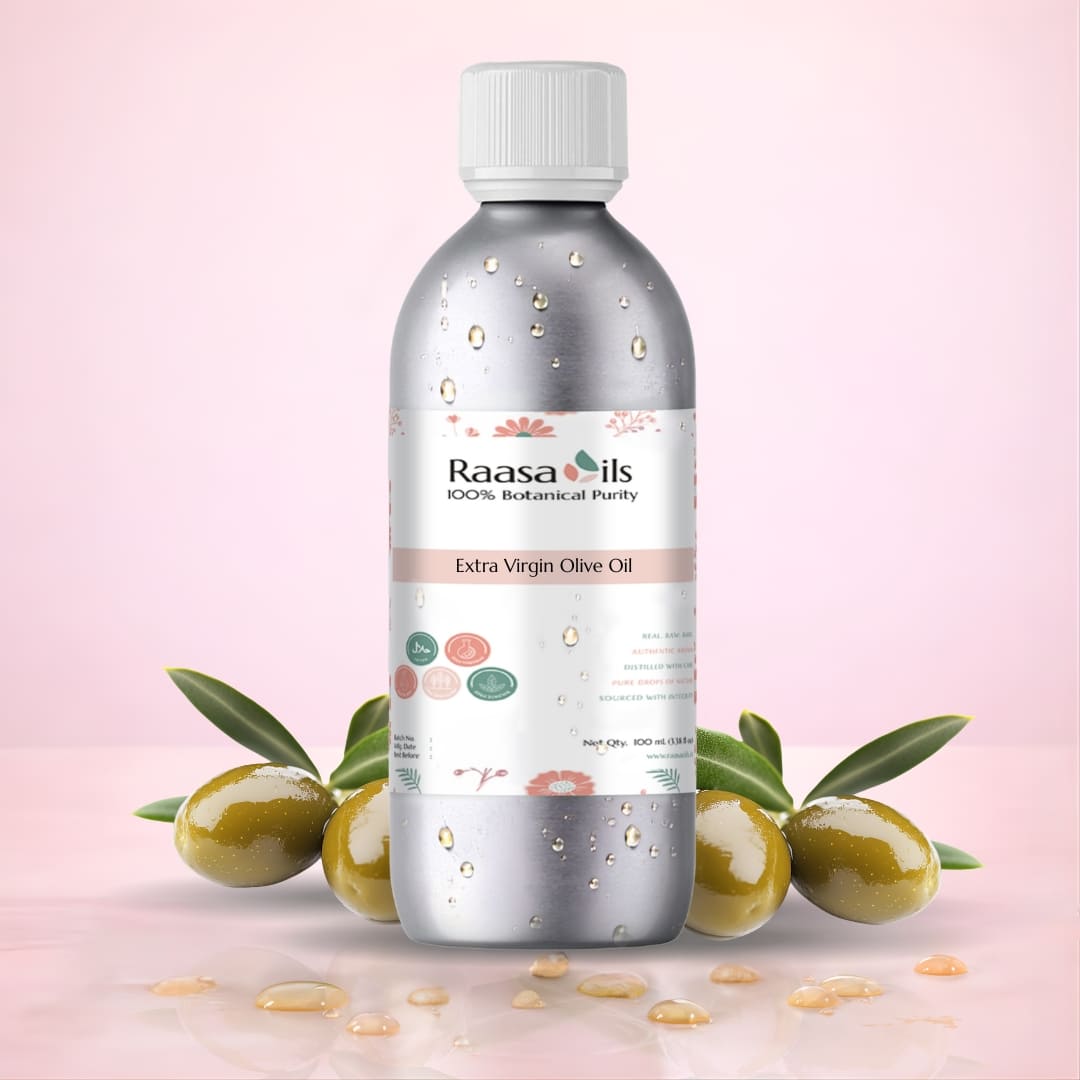 Bottle of Raasa Oils Extra Virgin Olive Oil with olives on a pink background