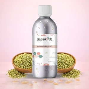 Raasa Oils bottle with fennel seeds on a pink background