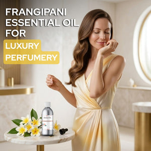 Woman in a bathroom with frangipani essential oil and flowers, promoting luxury perfumery.