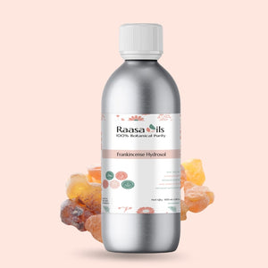 Bottle of Raasa Oils Frankincense Hydrosol on a light pink background