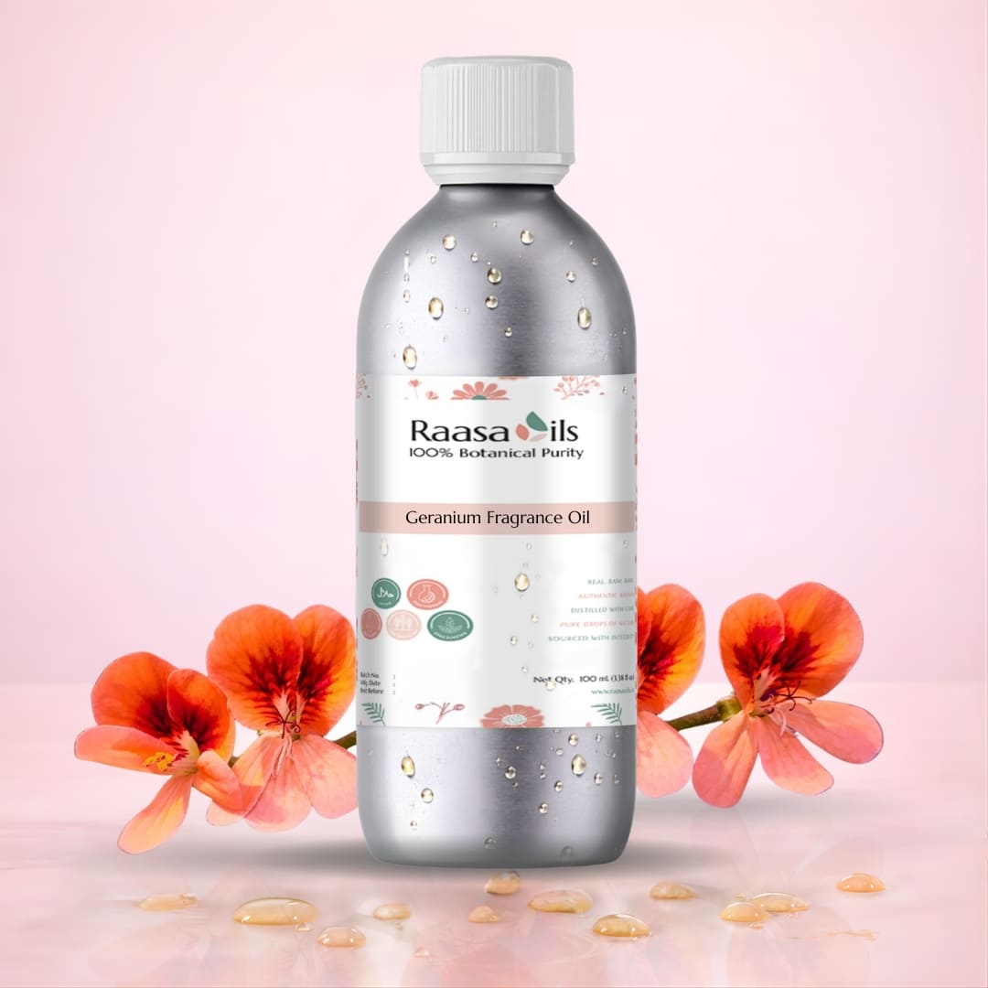 Bottle of Raasa Oils Geranium Fragrance Oil with flowers on a pink background