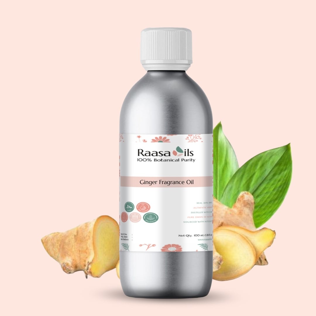 Bottle of Raasa Oils Ginger Fragrance Oil with ginger and leaves on a light pink background