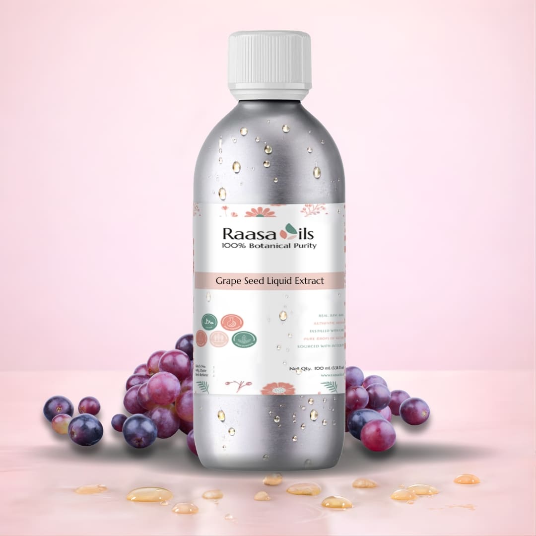 Bottle of Raasa Oils Grape Seed Liquid Extract with grapes on a pink background