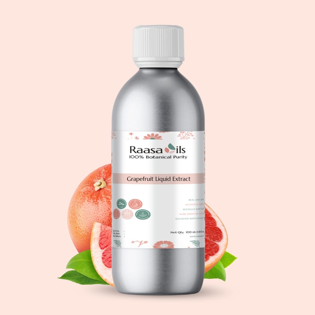 Bottle of Raasa Oils Grapefruit Liquid Extract with a pink background