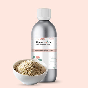 Bottle of Raasa Oils Hemp Seed Liquid Extract with a bowl of hemp seeds on a beige background