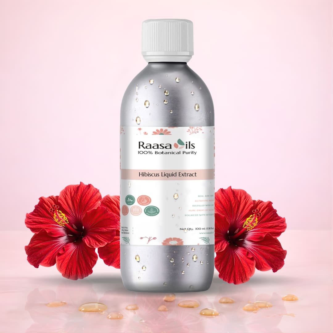 Bottle of Raasa Oils Hibiucus Liquid Extract with red flowers on a pink background