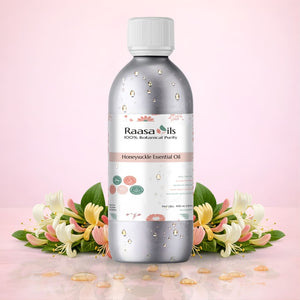 Raasa Oils Honeysuckle Essential Oil bottle with flowers on a pink background