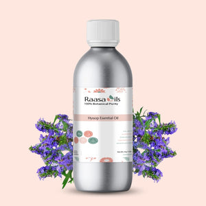 Bottle of Raasa Oils Hyssop Essential Oil with purple flowers on a light pink background