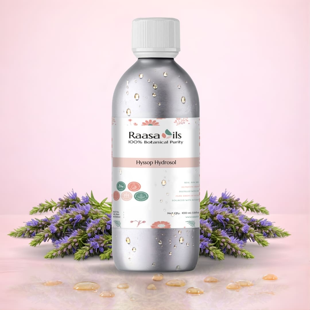 Raasa Oils bottle with lavender flowers on a pink background