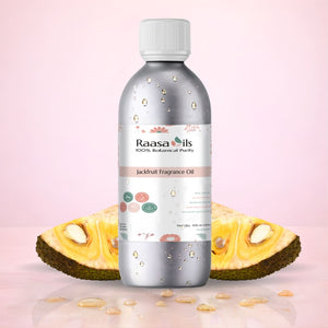 Raasa Oils Jackfruit Fragrance Oil bottle with jackfruit slices on a pink background