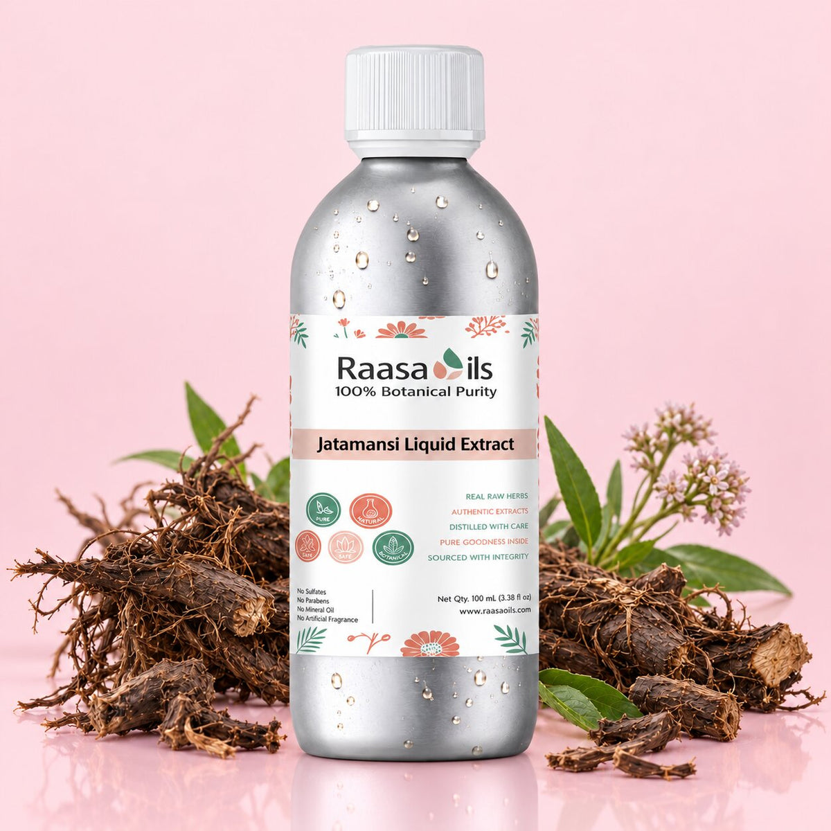 A bottle of Raasa oils Jatamansi Liquid Extract centered on a pink background, flanked by dried roots and green leaves. The bottle is metallic silver with a white cap and a white label featuring botanical illustrations.